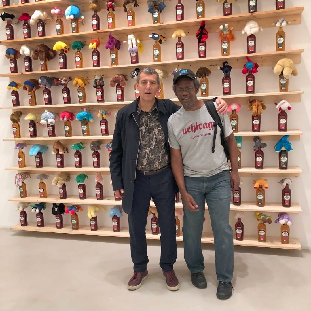Luc Bellier with artist Pope L., in front of Party Room, at Mitchell-Innes & Nash Gallery, New York, 2019
